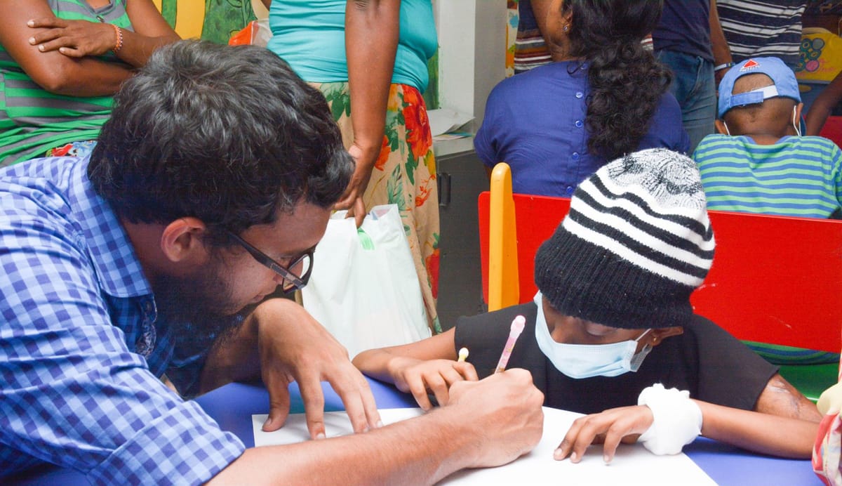 A miracle witnessed through love - Colours 2 - Hand in Hand '18